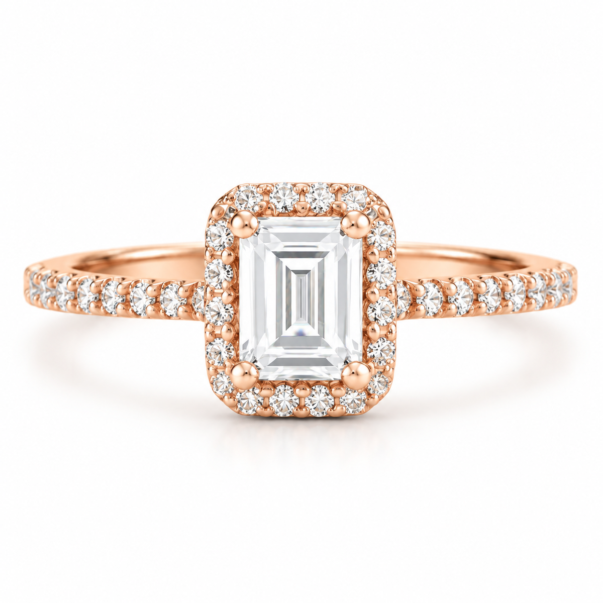 18K rose gold emerald cut engagement ring with rectangular pavé diamond halo, four-prong setting, and diamond accented band
