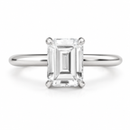 Silver emerald cut diamond engagement ring with elegant solitaire setting