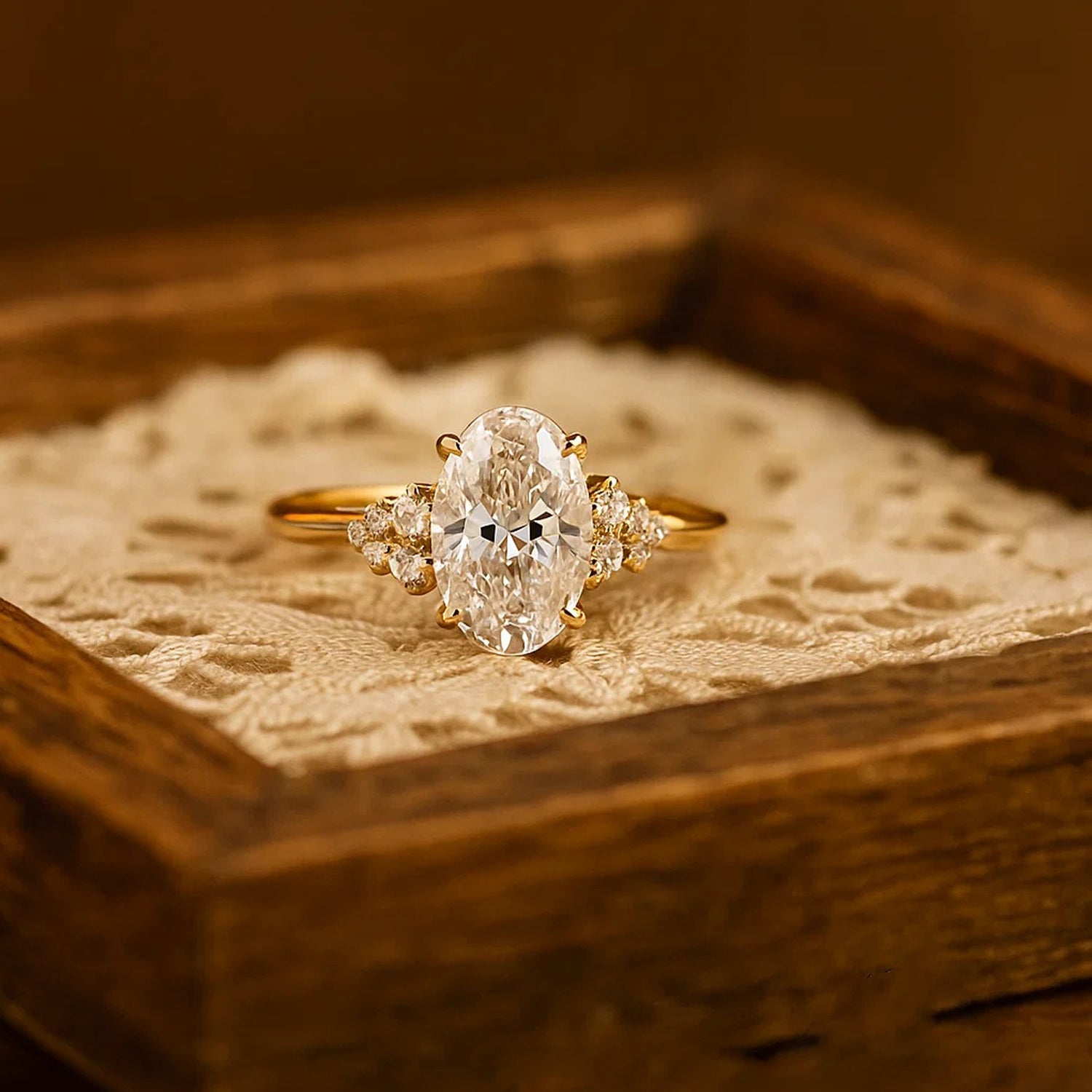 Elegant Oval-Cut Diamond Ring In 14K Yellow Gold With Side Stones.
