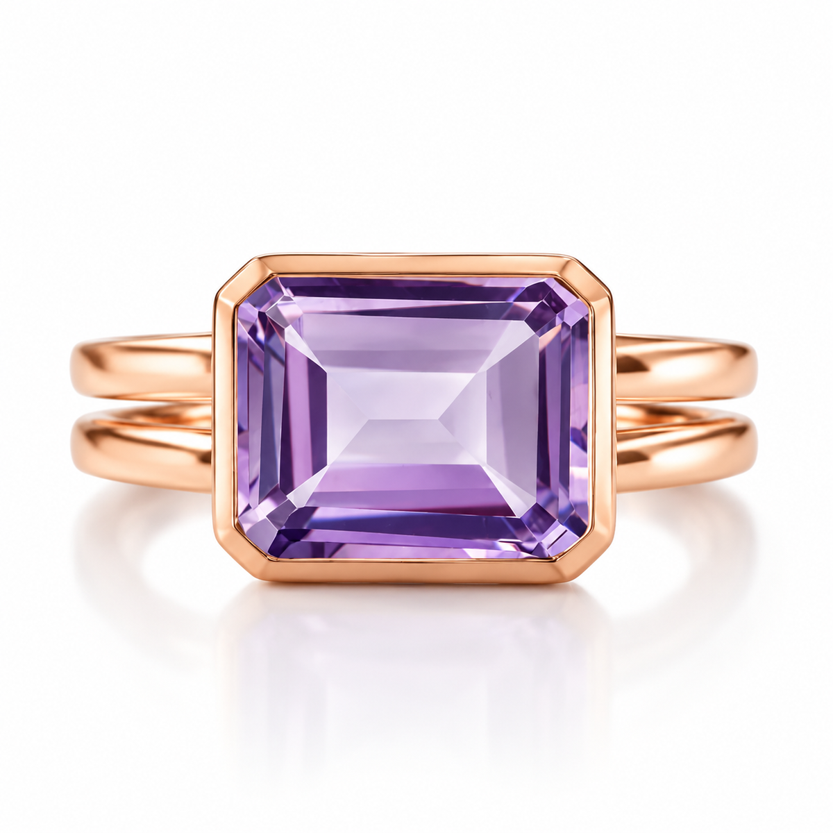 A rose gold ring featuring a large, square-cut emerald-cut purple amethyst gemstone, shown on a clean white background with a soft reflection.