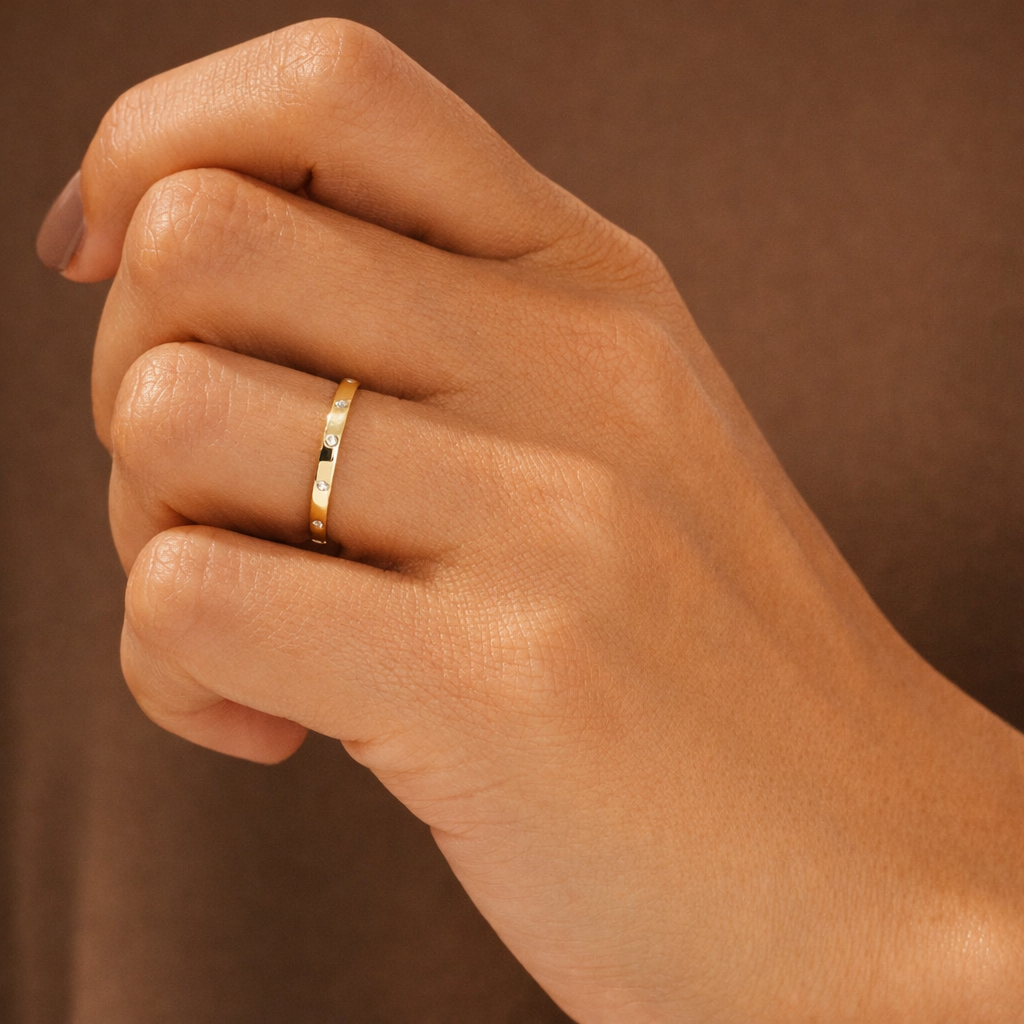 Yellow Gold Flush Setting Wedding Band With Sleek Diamond Accents
