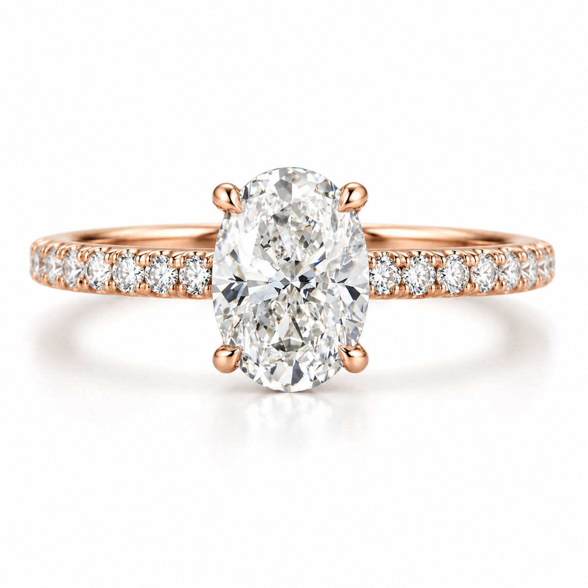 Oval cut diamond solitaire engagement ring featuring a pavé diamond band with a polished 18K rose gold vermeil setting and elegant four-prong design.