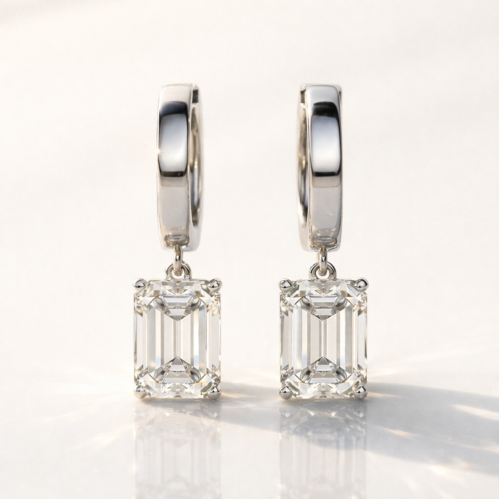 Gold Diamond Drop Earrings With Emerald Cut Center Stone
