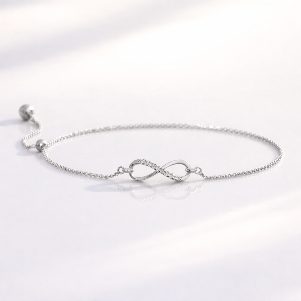 Gold infinity bracelet with diamond stones
