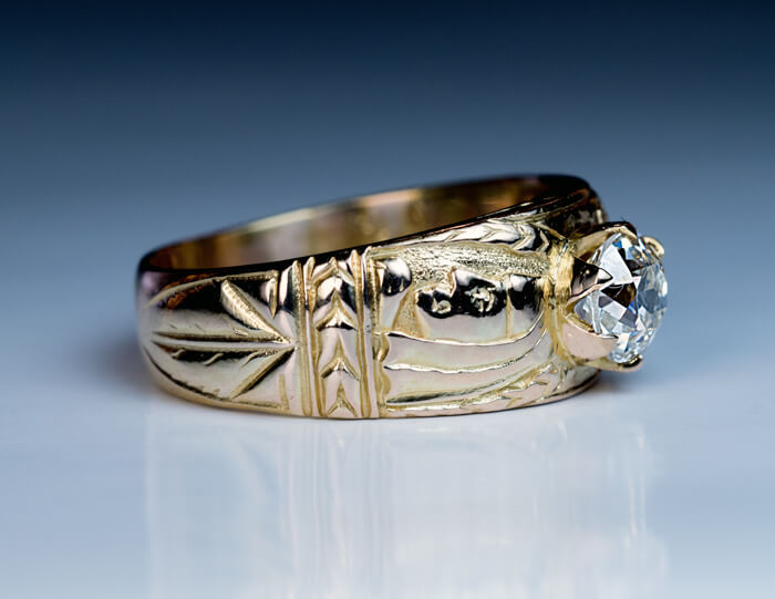 Statement Gold Ring For Men Featuring A Round Cut Diamond Or Moissanite With Textured Finish