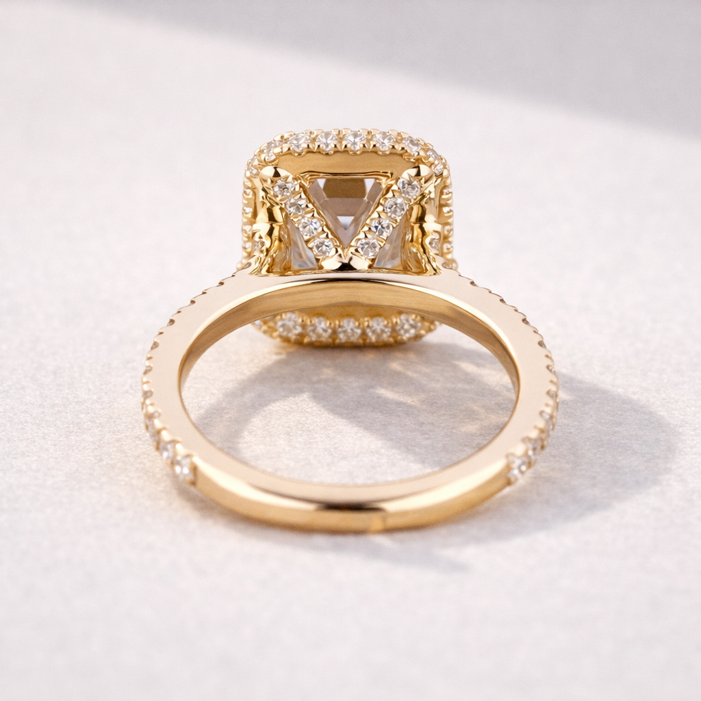 Cathedral Style Engagement Ring Featuring Emerald Cut Halo And Yellow Gold
