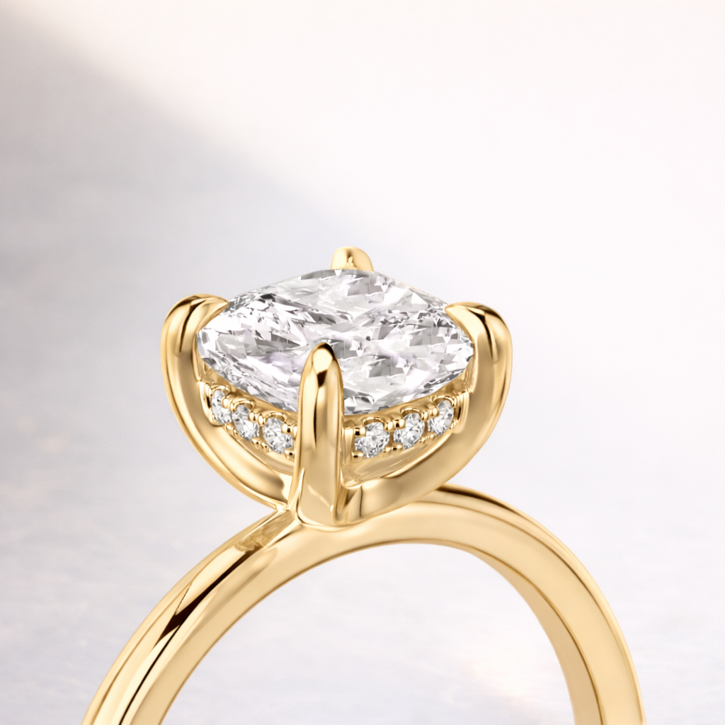 Hidden Halo Elongated Cushion Cut Gold Engagement Ring Design
