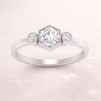 Round Cut Three Stone Engagement Ring With 6 Claw Prong Setting
