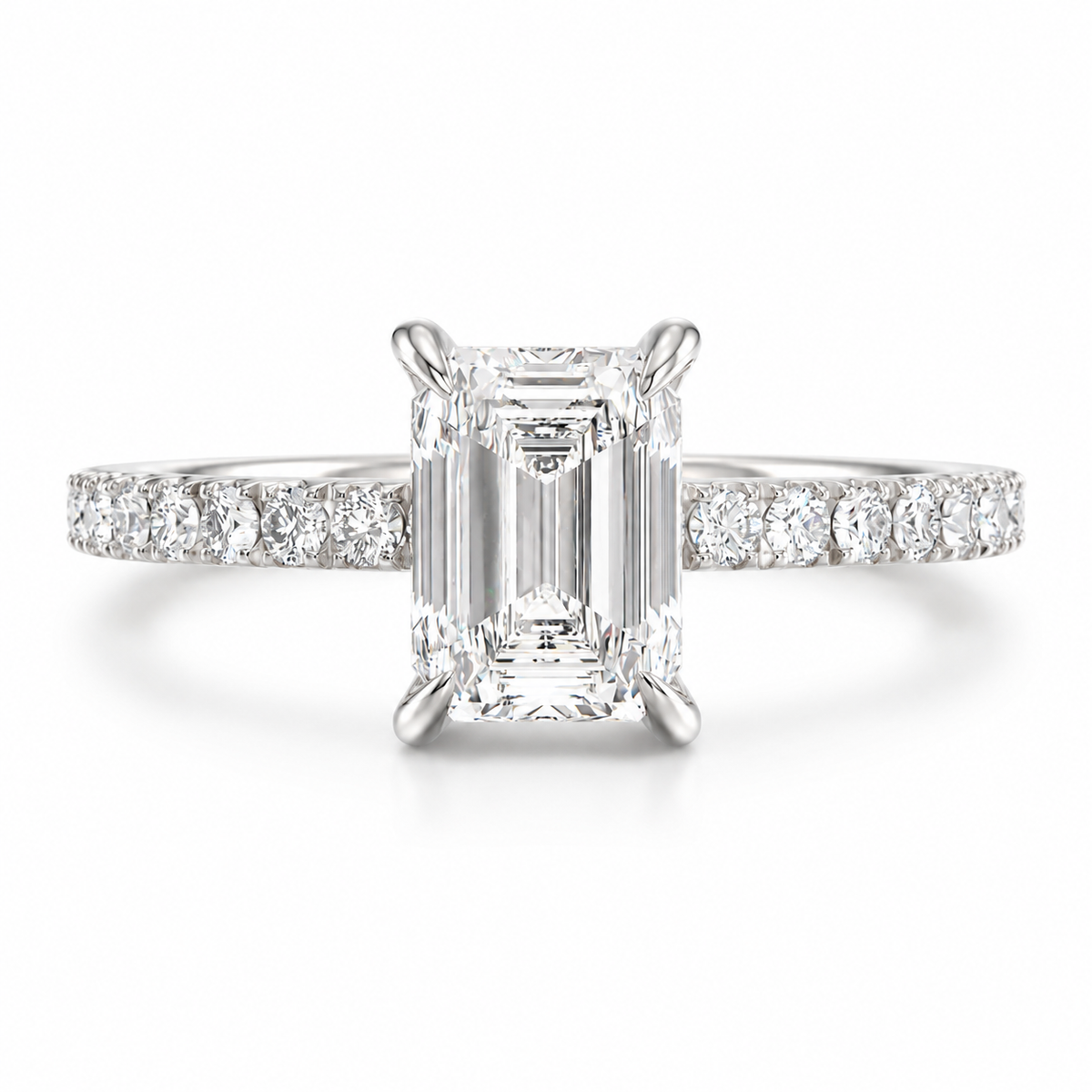 White gold emerald cut diamond engagement ring with pavé diamond band
