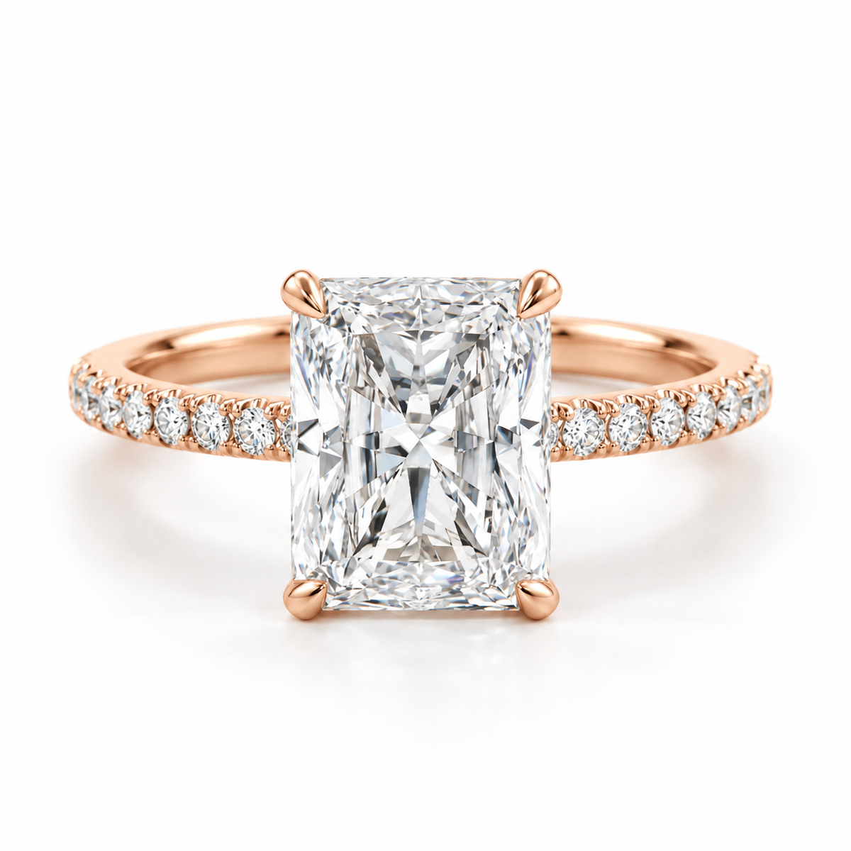Radiant cut diamond engagement ring in 18K rose gold vermeil with a slim pavé diamond band and four-prong setting.