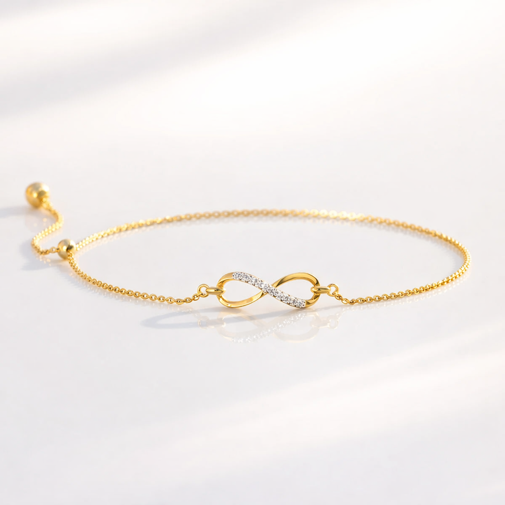 Women’s gold infinity bracelet with sparkle
