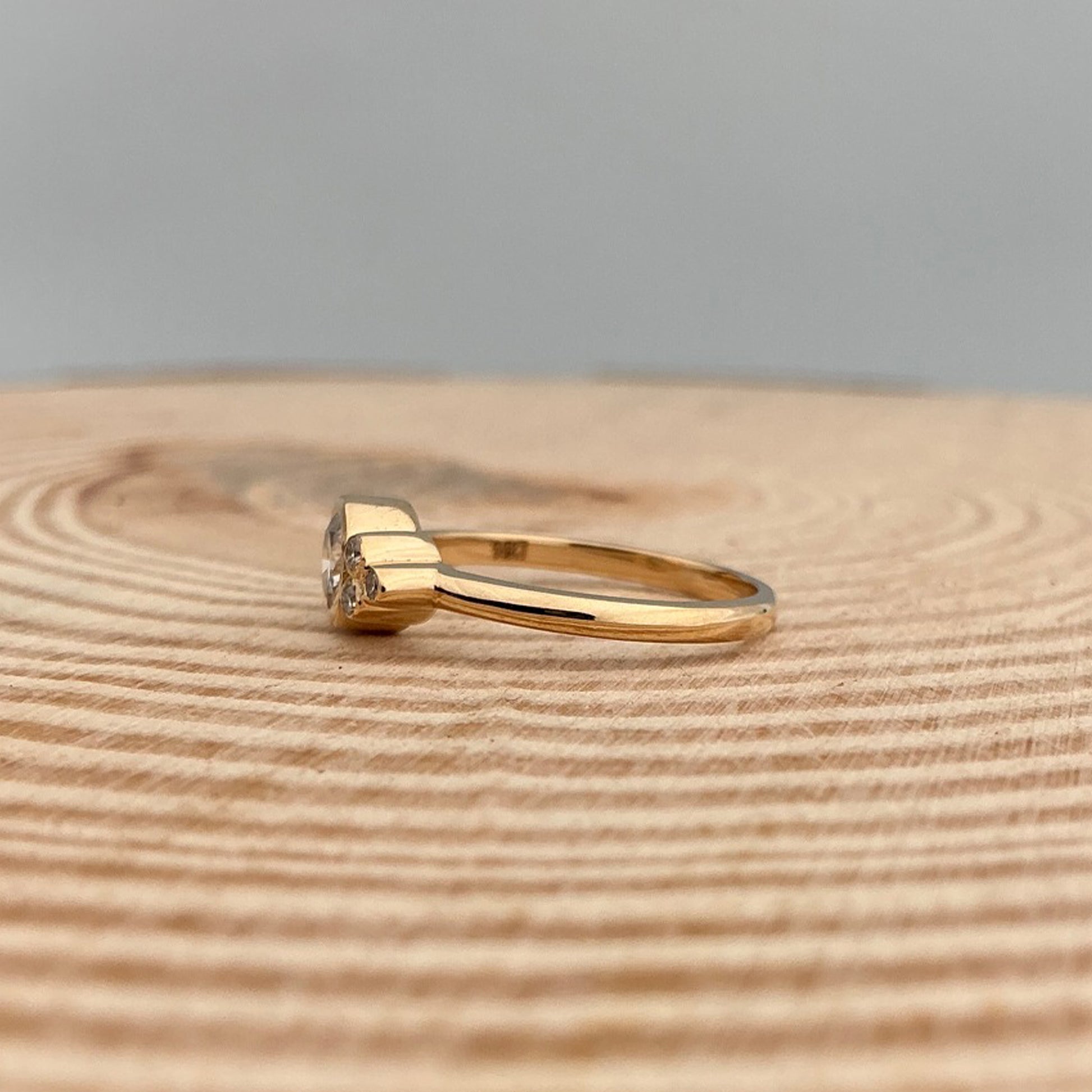 Brilliant Moissanite Engagement Ring With Square Prong Setting And Unique Ribbed Band Detail