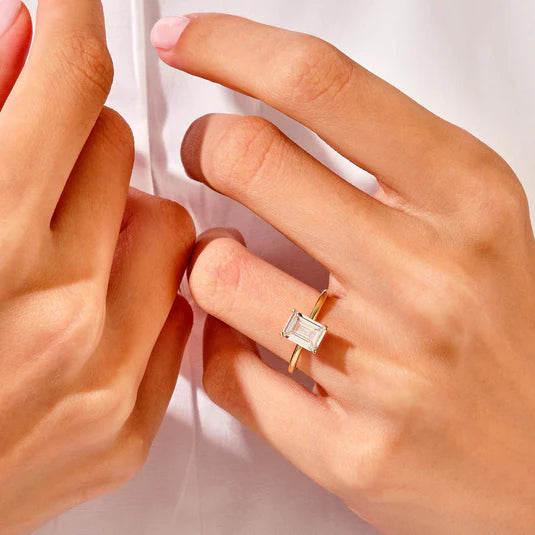 Rose gold emerald cut bridal ring set

