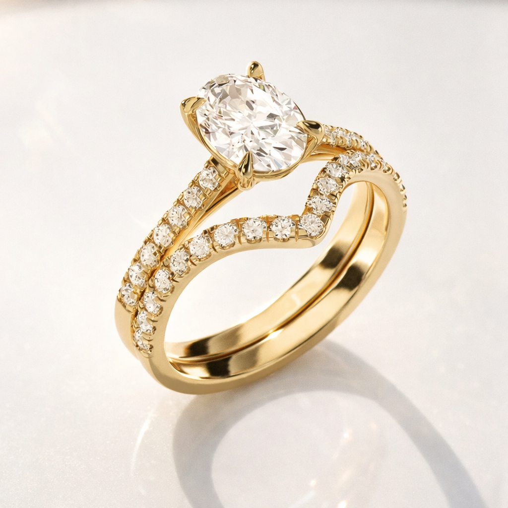 White gold oval diamond ring with curved band
