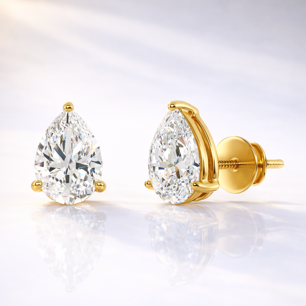 Gold Teardrop Earrings With Pear Cut Diamond In 3 Prong Setting
