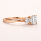 Diamond Ring Three Stone Setting Featuring A Four Claw Prong Design.
