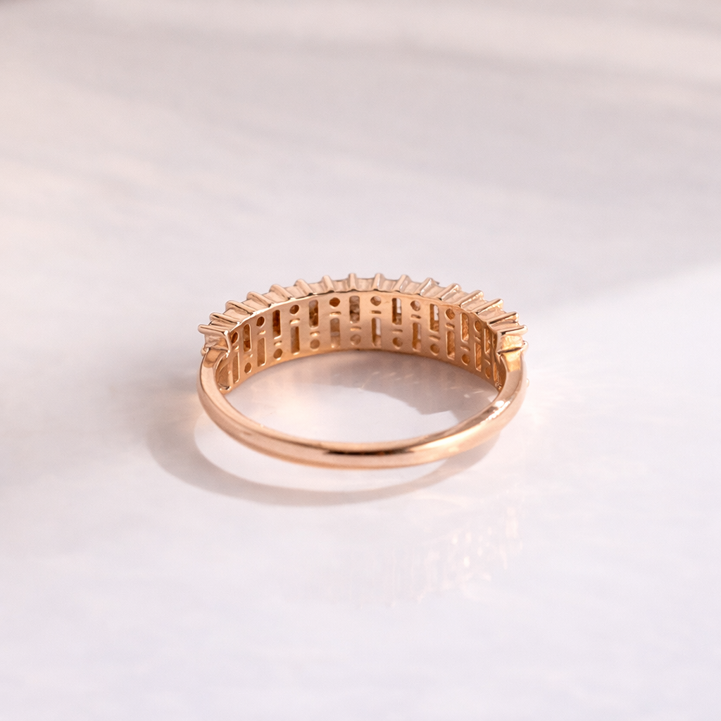 Dainty Rose Gold Moissanite Wedding Band With Prong Set Stones
