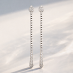 Long Diamond Drop Earrings In Yellow Gold With Round Cut Stones

