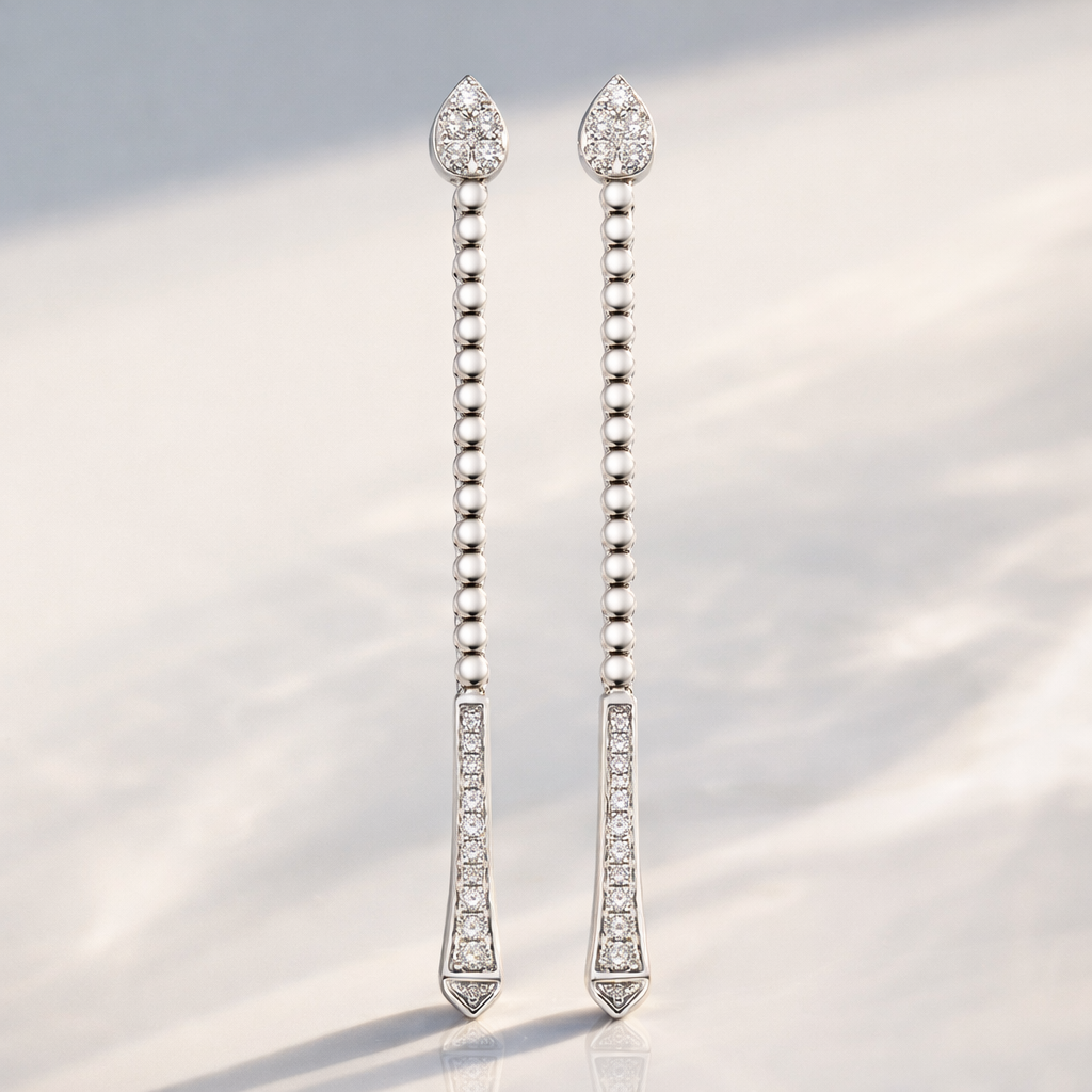 Long Diamond Drop Earrings In Yellow Gold With Round Cut Stones
