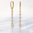 Pear Shape Outline Long Drop Diamond Earrings In Gold
