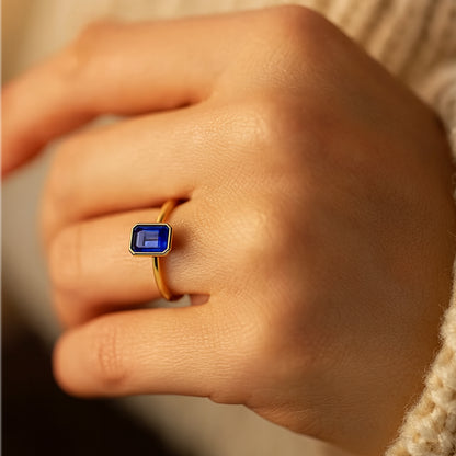 Emerald Cut Blue Sapphire Rings In Yellow White And Rose Gold