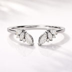 Open marquise wedding band with round diamonds in yellow gold
