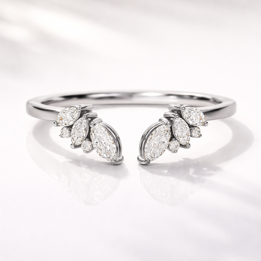 Open marquise wedding band with round diamonds in yellow gold
