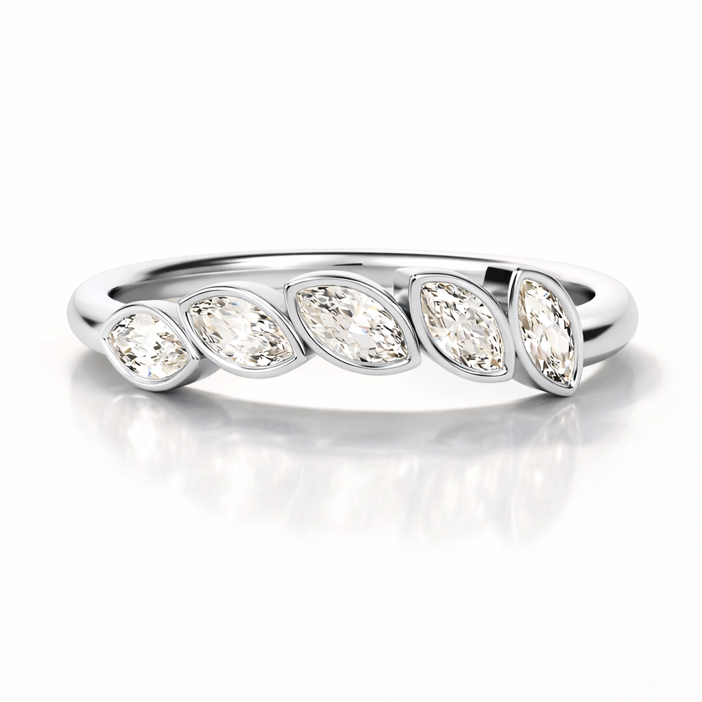 Minimal bezel set marquise wedding band design
