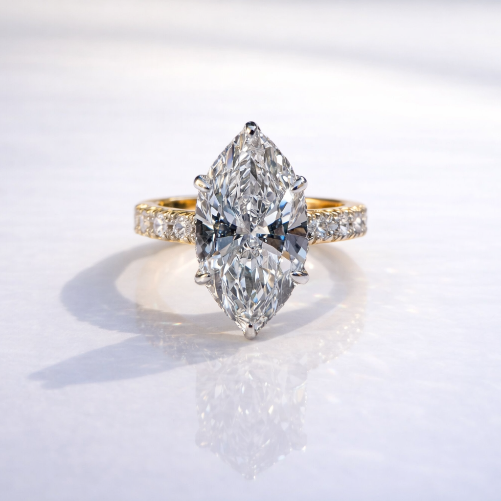 Marquise Cut Diamond Ring With 6 Claw Prong Setting And Hidden Halo
