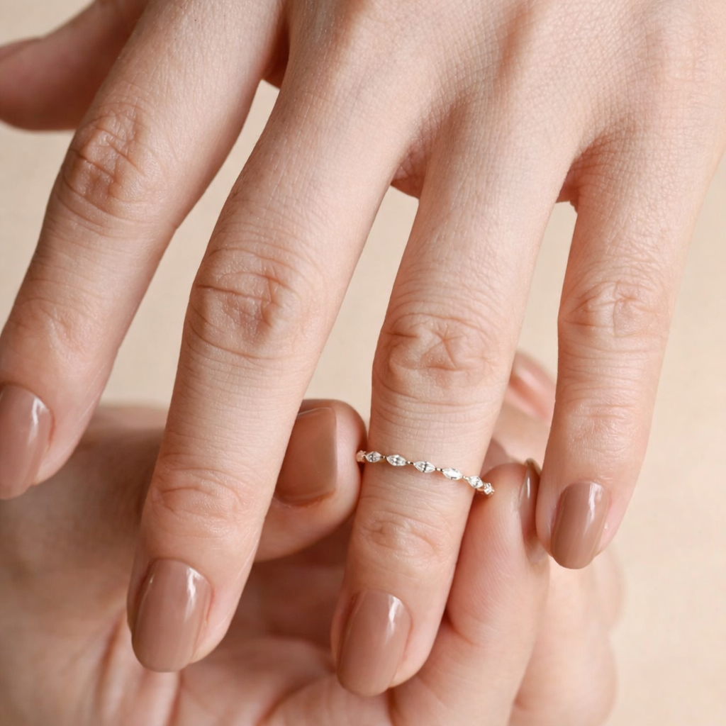 Curved V Shaped Wedding Band With Round Cut Diamond Accents
