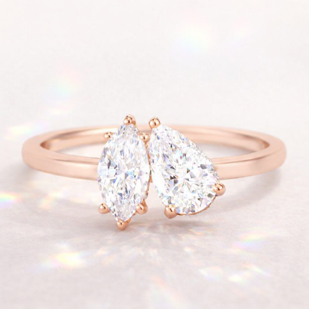 Marquise And Pear Diamond Toi Et Moi Engagement Ring In Yellow Gold.
