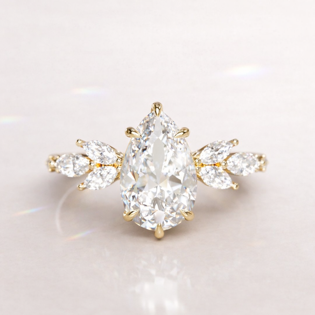 White Gold Teardrop Engagement Ring With Side Stone Diamond Design
