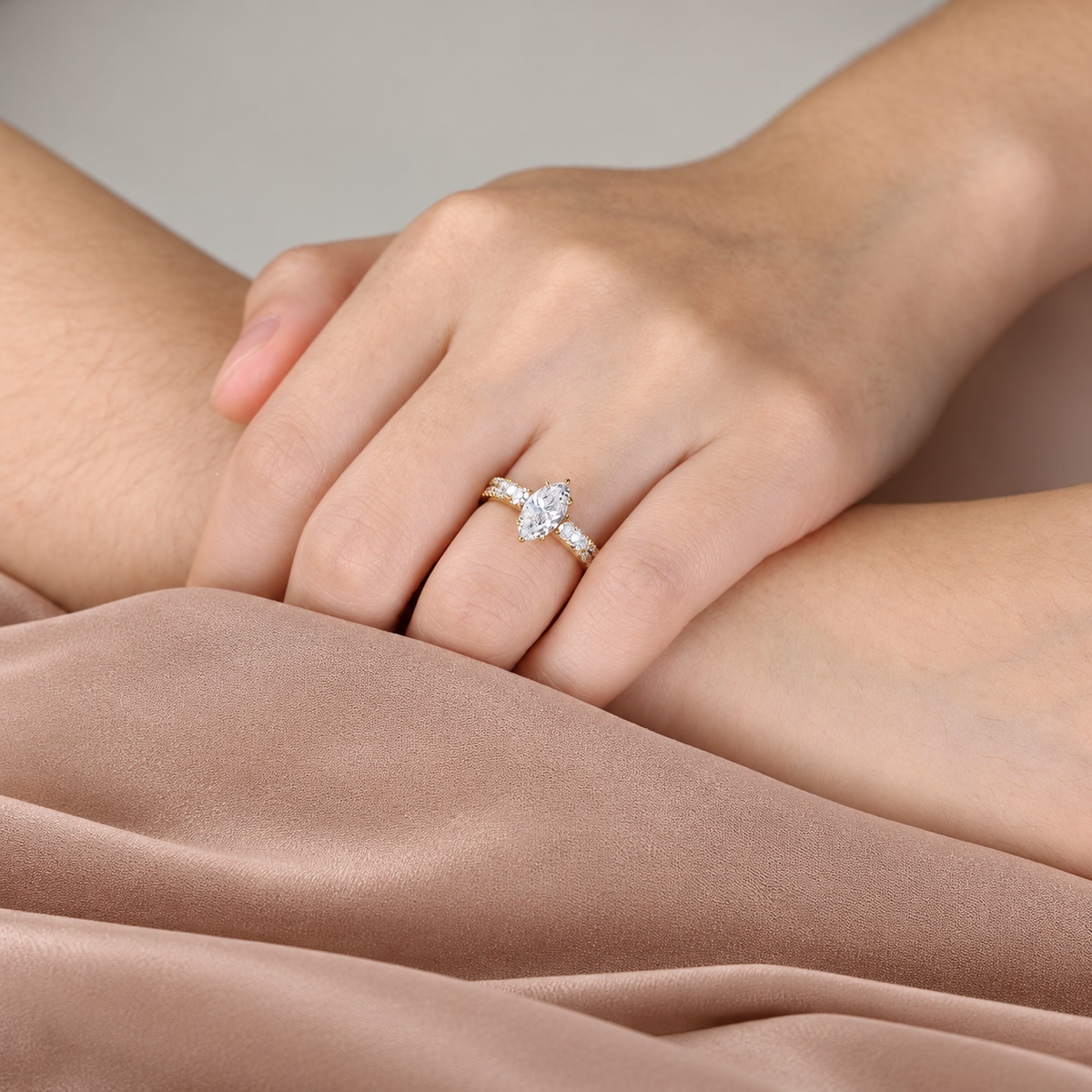 Marquise cut colorless ring stone with an elongated shape and bright sparkle in a six-prong setting