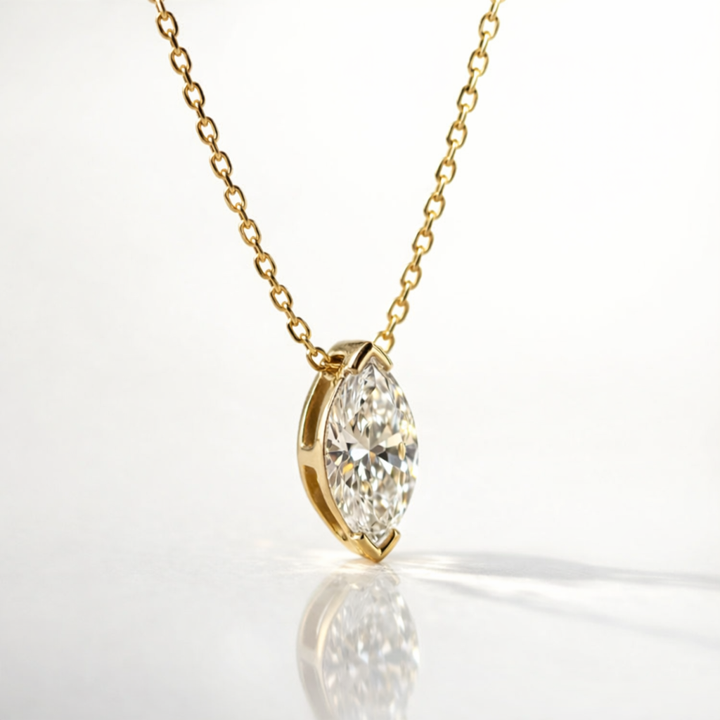14K Gold Cross Pendant With Round-Cut Diamond Centerpiece In A Prong Setting.
