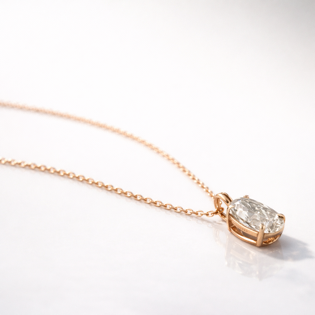 Custom Yellow Gold Pendant Featuring Oval Moissanite In 4-Claw Setting.
