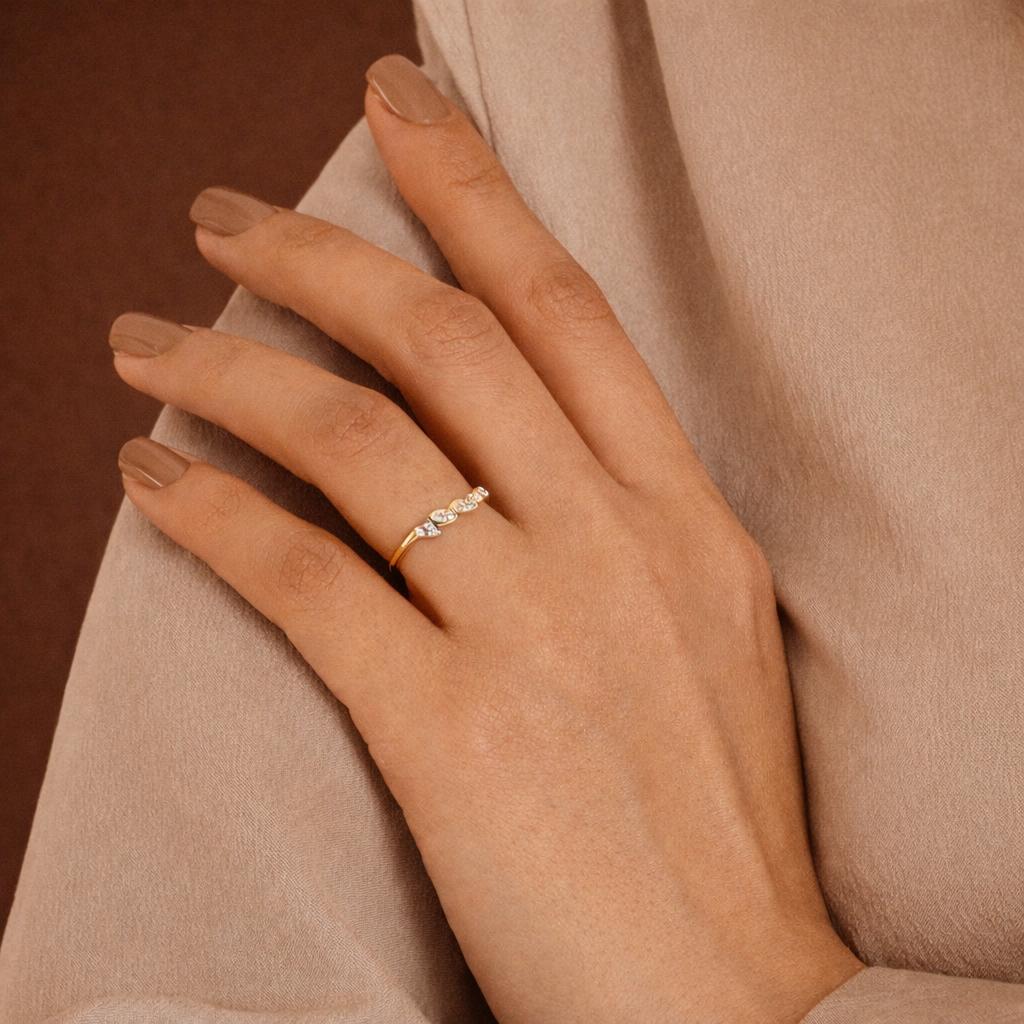 Curved bezel marquise cut wedding band for women
