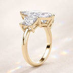 Moissanite Engagement Ring With Marquise Center And Trapezoid Side Stones
