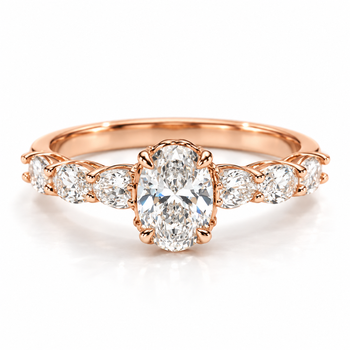Rose Gold oval-cut engagement ring with sparkling side stones and polished rose gold band