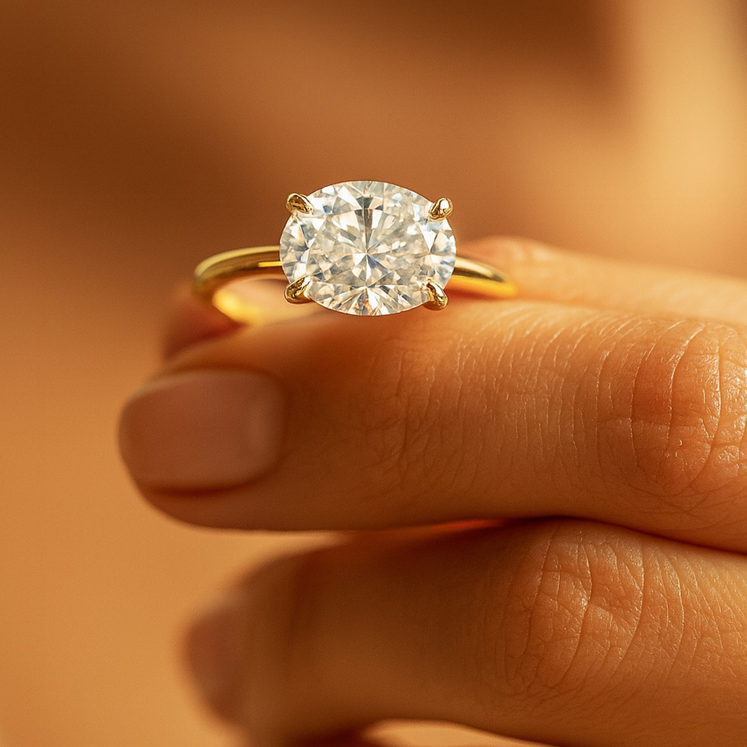 Classic Oval Diamond Engagement Ring In A Timeless Gold Solitaire Setting, Designed For Modern Elegance And Lasting Brilliance.