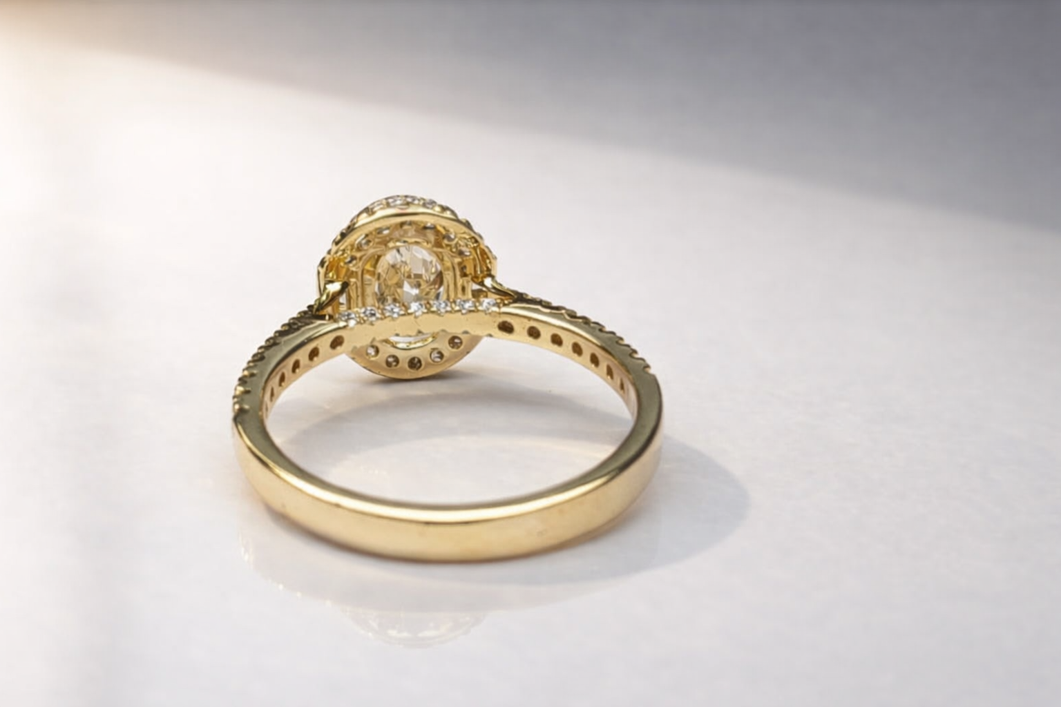 Yellow Gold Oval Halo Engagement Ring