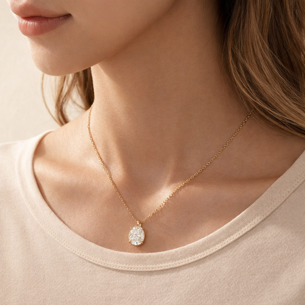 Elegant Yellow Gold Pendant With Oval Diamond And 4-Prong Setting.
