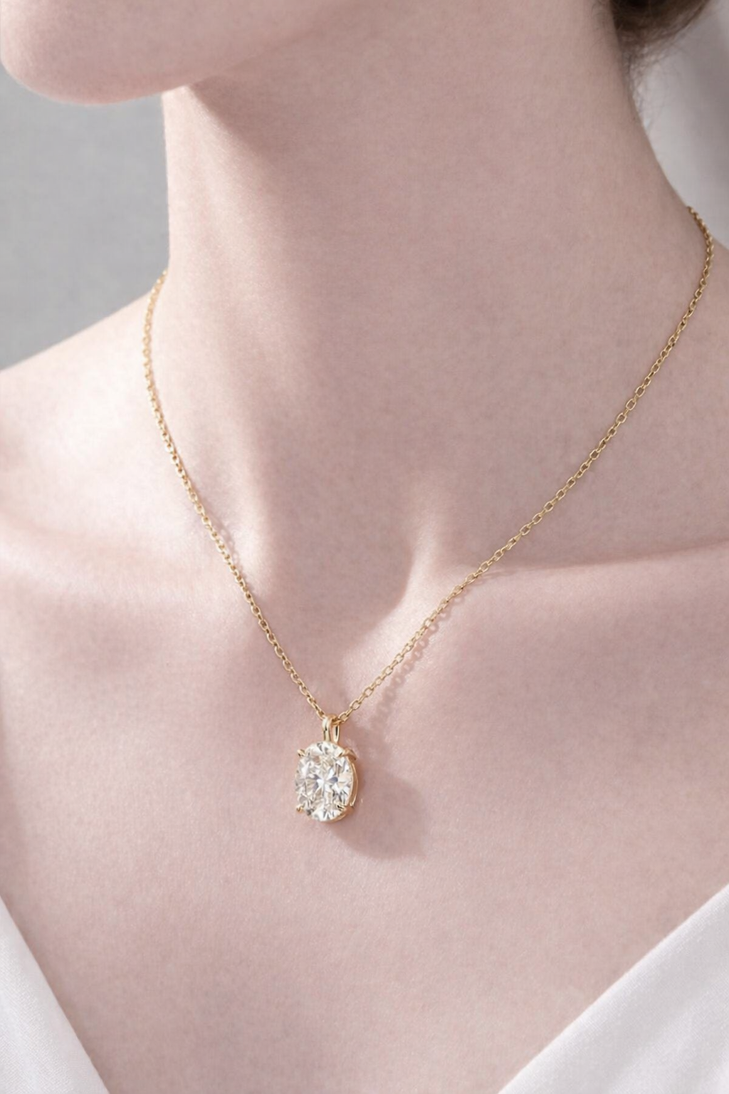 Lab-Grown Moissanite Oval Pendant In Yellow Gold With Dainty Design.
