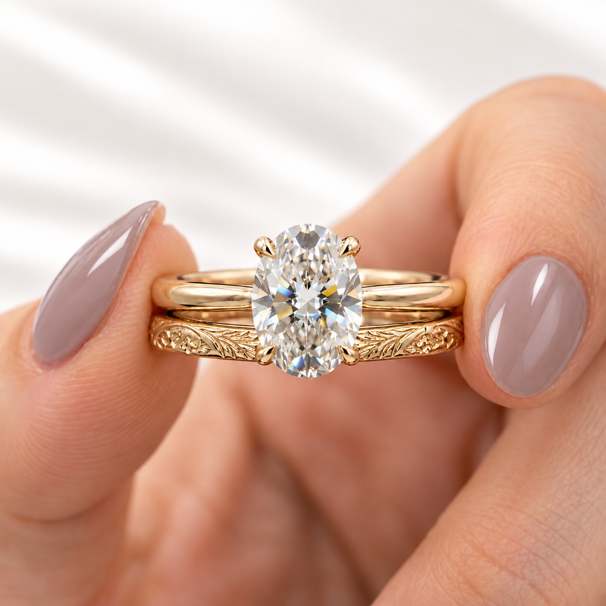 Oval cut colorless ring stone with crisp brilliant facets reflecting bright white and rainbow light