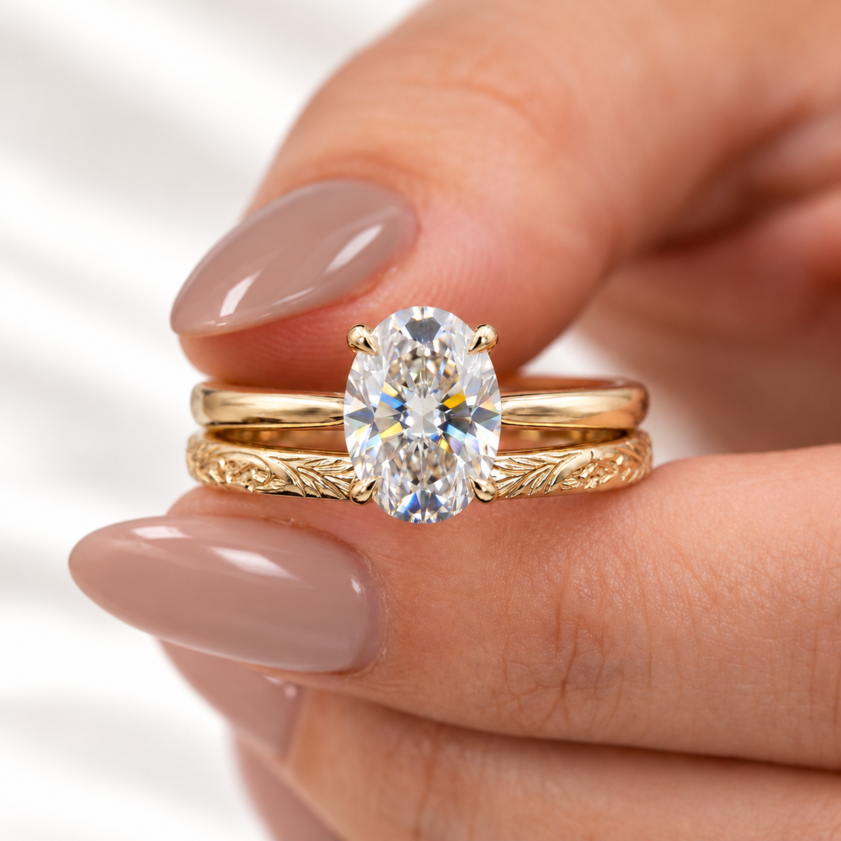 Oval cut clear ring stone with high clarity, symmetrical facets, and four-prong setting