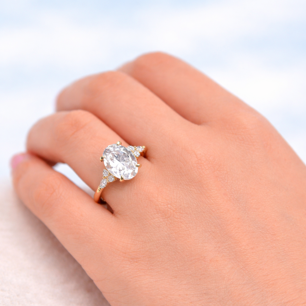 Oval Cut Moissanite Ring With Round And Marquise Side Stones
