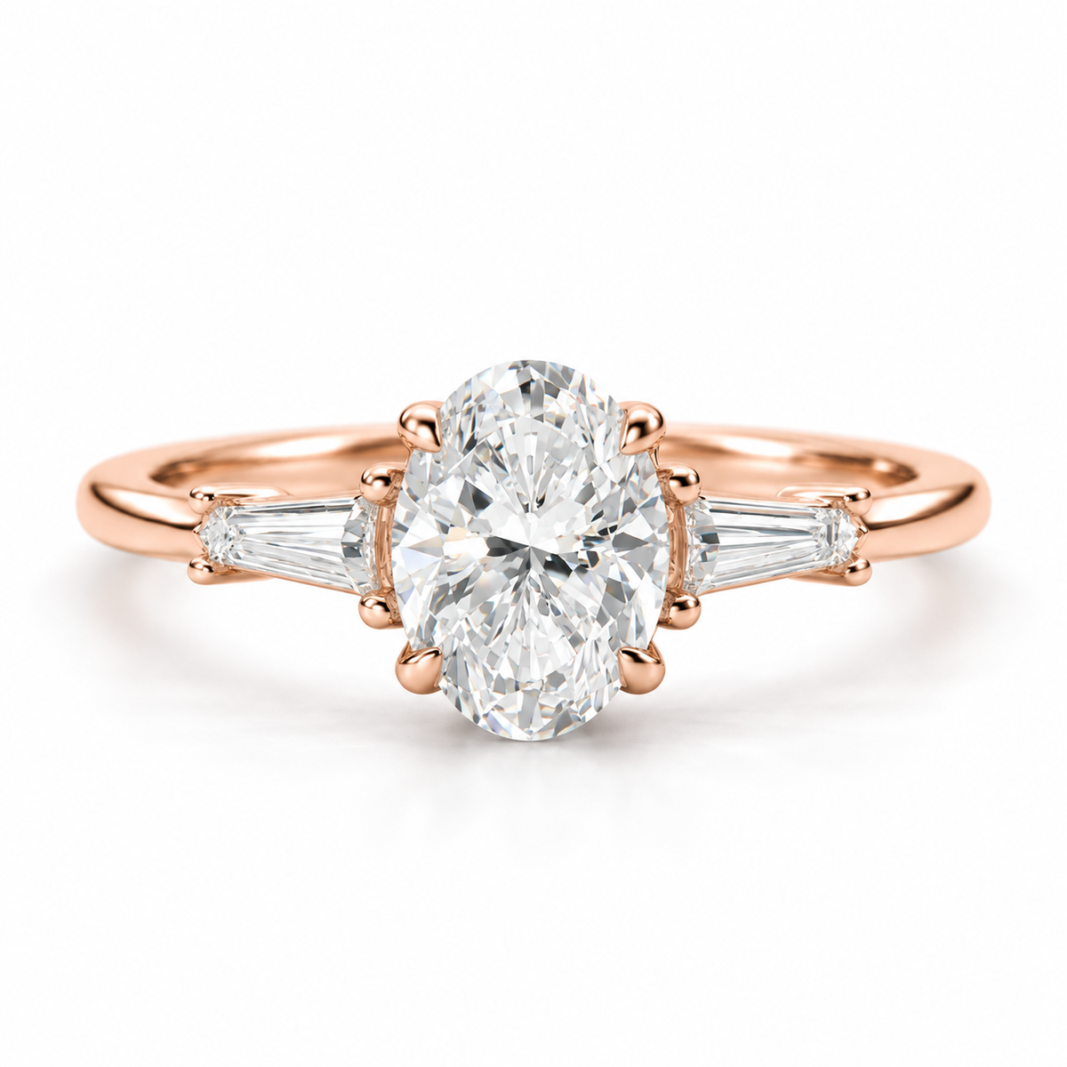 Oval cut diamond engagement ring in polished silver with tapered baguette side diamonds and a six-prong setting.