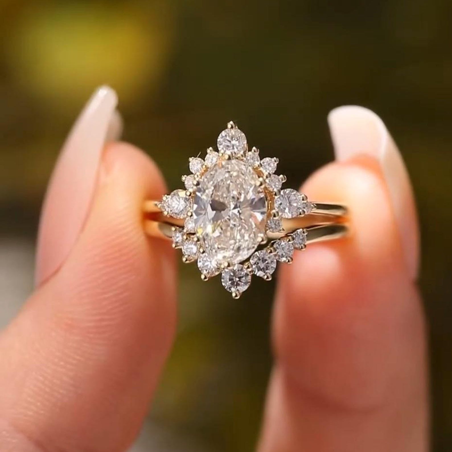Oval Cut Engagement Ring In White Gold With Halo Bridal Design