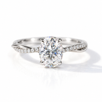 Polished silver oval-cut engagement ring with a twisted pavé diamond band and four-prong setting