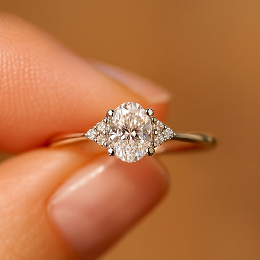 2ct Oval Moissanite Three Stone Engagement Ring With Triangle Cluster Accents In Gold VVS1 Clarity
