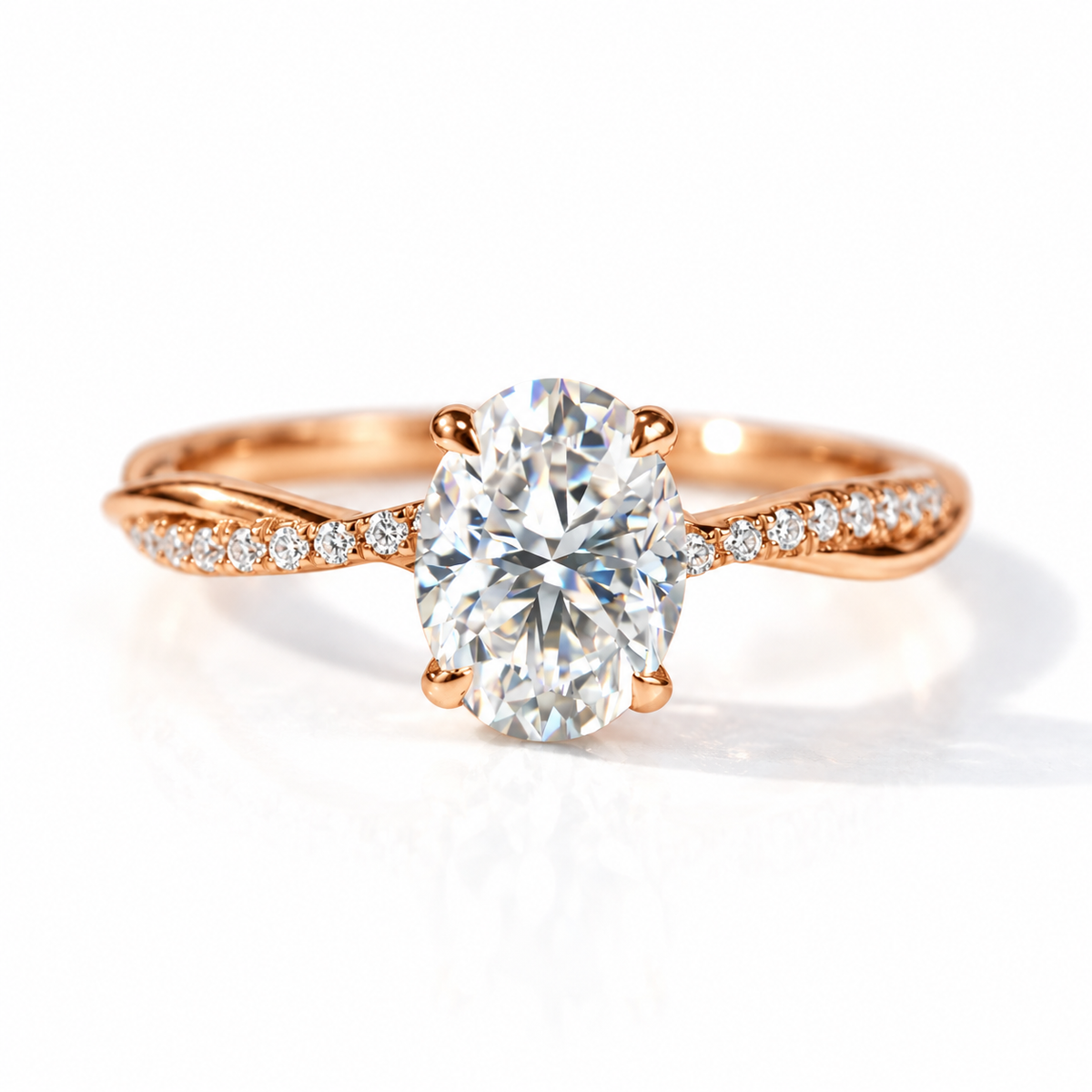 18K rose gold oval-cut engagement ring with a twisted pavé diamond band and four-prong setting
